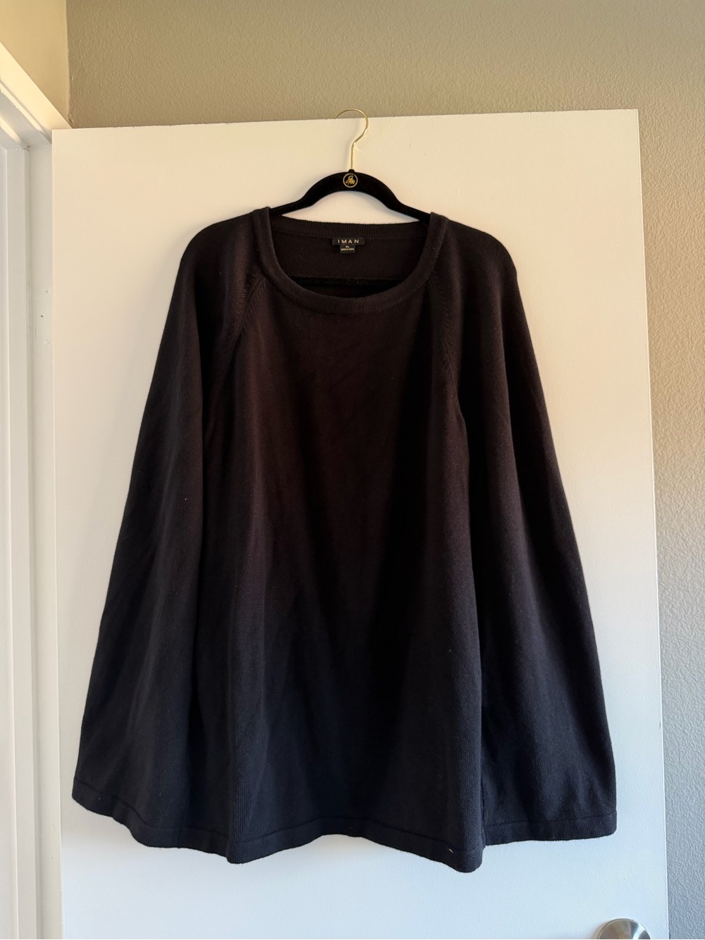 IMAN Sleeveless Black Knit Crewneck Sweater